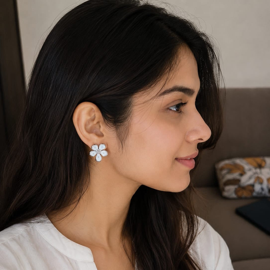 Woman wearing a floral earring in a casual setting